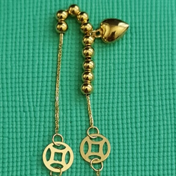 18k Bracelet with small balls and cute money catcher design as charm - Picture 6 of 16